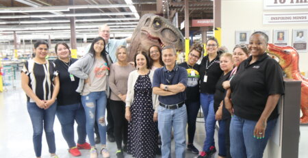 TyRex Family Members pose with Rex the Dinosaur